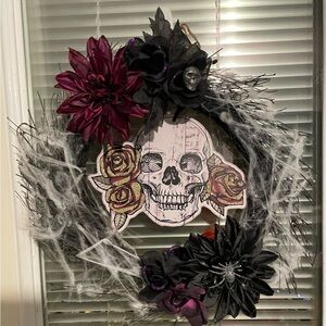 Gothic Skull Halloween Wreath with Black and Purple Flowers and strobe lights